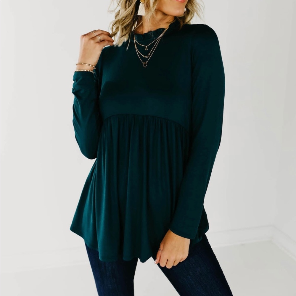 Long sleeve peplum top.